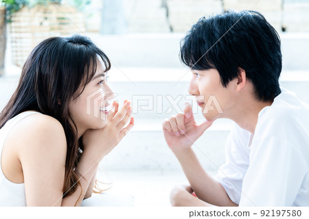 couple staring at each other 92197580