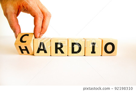 Cardio or hardio symbol. Businessman turns wooden cubes and changes concept words hardio to cardio. Beautiful white background. Sport, healthy lifestyle and cardio or hardio concept. Copy space. Cardio or hardio symbol. Businessman turns wooden cubes and changes concept words hardio to cardio. Beautiful white background. Sport, healthy lifestyle and cardio or hardio concept. Copy space. 92198310