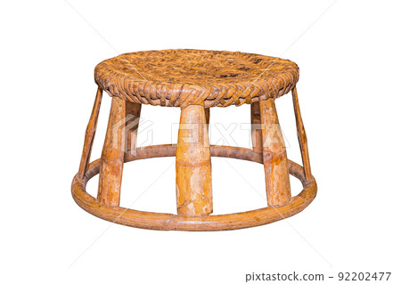 Low chair made of bamboo and rattan weave isolated on white background Low chair made of bamboo and rattan weave isolated on white background 92202477