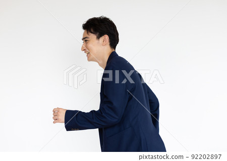 A cool man who starts running 92202897