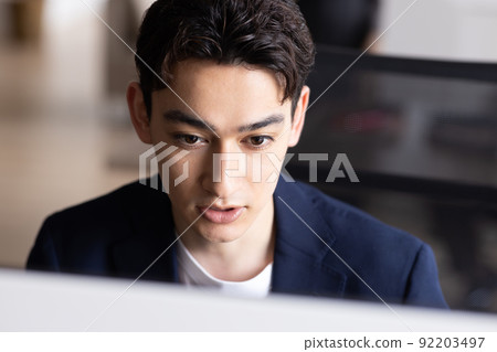 Businessman doing desk work 92203497