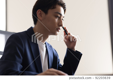 Businessman doing desk work 92203639