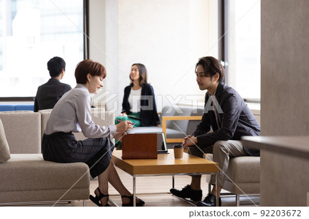 Young businessman having a meeting 92203672