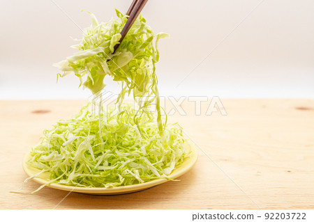 Shredded cabbage on a large tent 92203722