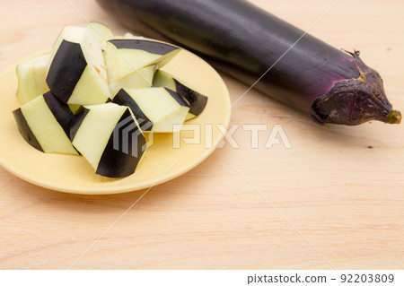 Cut eggplant on a plate 92203809