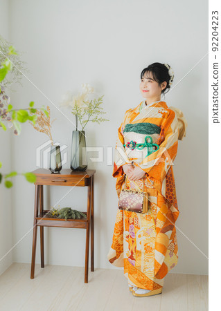 Woman with orange furisode 92204223