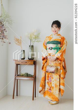 Woman with orange furisode 92204228