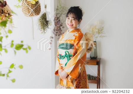 Woman with orange furisode Woman with orange furisode 92204232