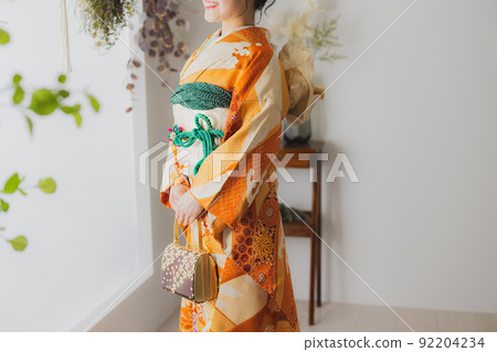 Woman with orange furisode 92204234