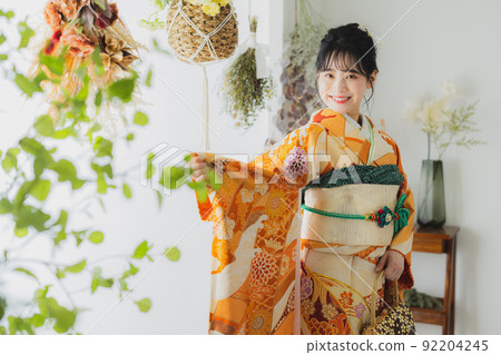 Woman with orange furisode 92204245
