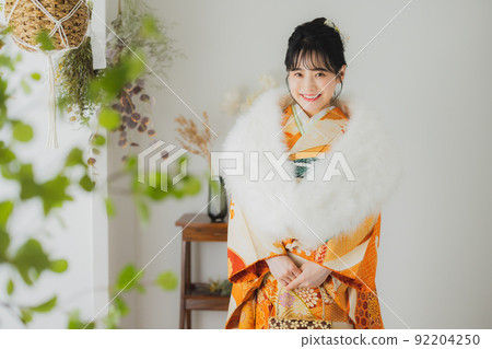 Woman with orange furisode 92204250