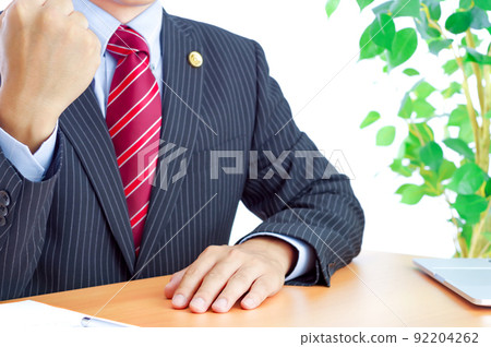 Male lawyer doing a guts pose 92204262