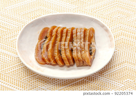 Spicy pickled in gun on a plate 92205374