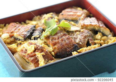 Eel broiled eel with eggs and trefoil on top 92206045