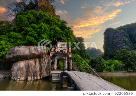 Bich Dong pagoda in Ninh Binh, Vietnam in sunset 92206589
