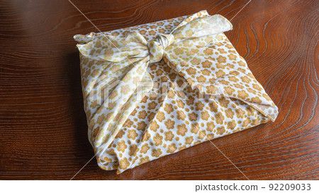 Image of a gift wrapped in a furoshiki Image of a gift wrapped in a furoshiki 92209033