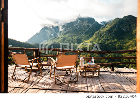 Chairs on the balcony and mountain view 92210404