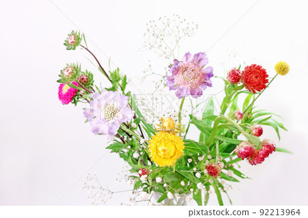 A bouquet of natural flowers, botanical frame, indoor photography A bouquet of natural flowers, botanical frame, indoor photography 92213964