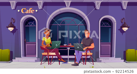 Man and woman work on laptops sitting in cafe Man and woman work on laptops sitting in cafe 92214526