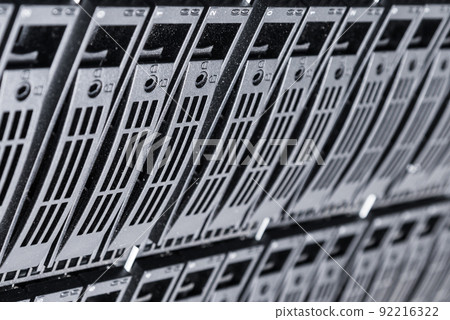 Row of hard disks used for data storage in internet data center Row of hard disks used for data storage in internet data center 92216322