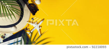 Flat lay traveler accessories on yellow background with blank space for text. Top view travel or vacation concept. Summer background 92218093