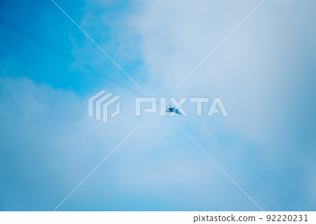 Airplane flying in cloudy sky Airplane flying in cloudy sky 92220231