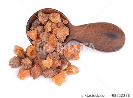 Myrrh resin in wooden spoon, isolated on white background. Pile of natural Commiphora myrrha. Sweet Myrrh Opoponax. Incense. Myrrh resin in wooden spoon, isolated on white background. Pile of natural Commiphora myrrha. Sweet Myrrh Opoponax. Incense. 92222288