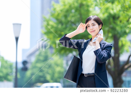 Female business commuting office business woman Female business commuting office business woman 92223280