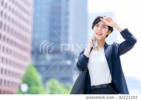 Female business commuting office business woman Female business commuting office business woman 92223283