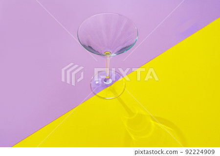 Empty transparent glass on a color background with copyspace. Empty transparent glass on a color background with copyspace. 92224909