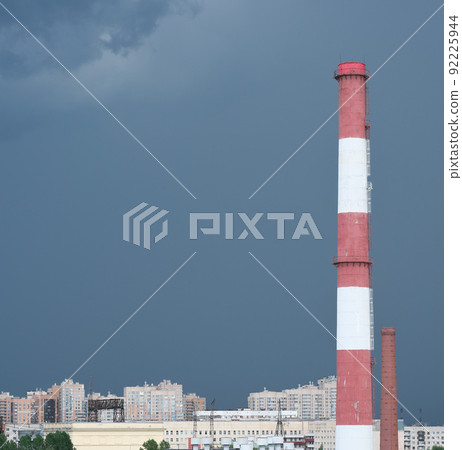 pipes of thermal power plant, industrial plant in a city. ecology and environmental pollution 92225944