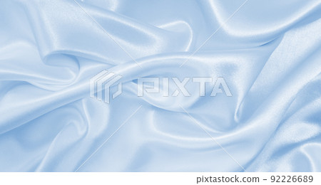 Smooth elegant blue silk or satin luxury cloth texture as abstract background. Luxurious background design Smooth elegant blue silk or satin luxury cloth texture as abstract background. Luxurious background design 92226689