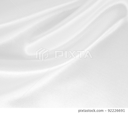 Smooth elegant white silk or satin luxury cloth texture as wedding background. Luxurious background design Smooth elegant white silk or satin luxury cloth texture as wedding background. Luxurious background design 92226691