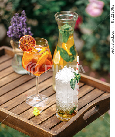 Variety of refreshing drinks in the garden Variety of refreshing drinks in the garden 92228062