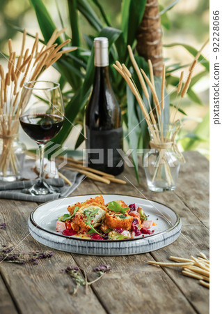 Gourmet fried rolls dish red wine 92228066