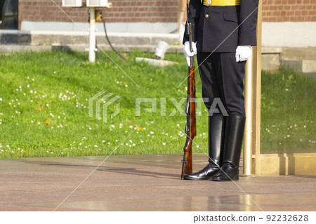 Russian soldier on guard in the Moscow Kremlin. Honor guard near the tomb of the unknown soldier. The dress uniform of the Russian military. Russian politics and army concept. Russian soldier on guard in the Moscow Kremlin. Honor guard near the tomb of the unknown soldier. The dress uniform of the Russian military. Russian politics and army concept. 92232628