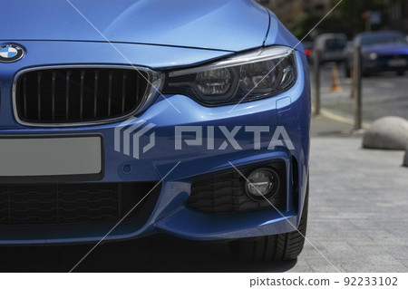 BMW car on city street, close-up BMW car on city street, close-up 92233102