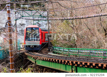 Hakone Tozan Railway vehicle passing through a curve near Gora Hakone Tozan Railway vehicle passing through a curve near Gora 92235204