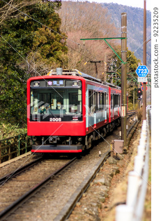 Hakone Tozan Railway vehicle passing through a curve near Gora Hakone Tozan Railway vehicle passing through a curve near Gora 92235209