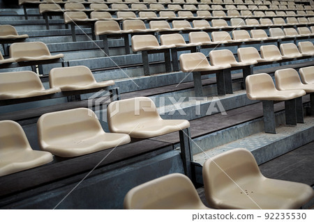 Empty seats on the bleachers of a performance hall 92235530