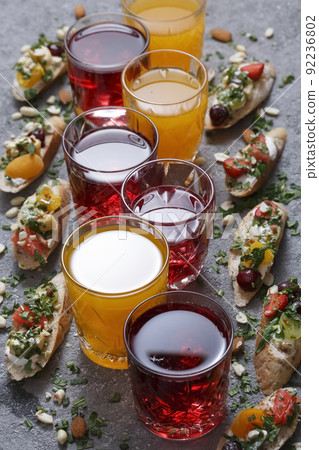 Summer drinks and toasts with fruits Summer drinks and toasts with fruits 92236802