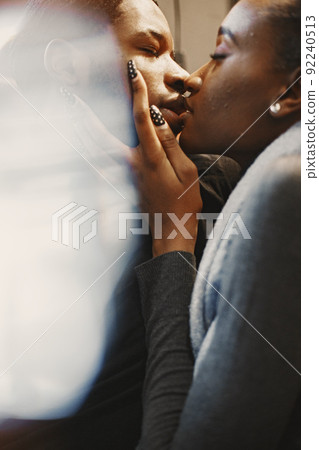 Two young people in cafe. African couple enjoying the time spending with each other. Two young people in cafe. African couple enjoying the time spending with each other. 92240513