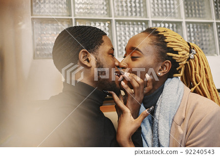 Two young people in cafe. African couple enjoying the time spending with each other. 92240543