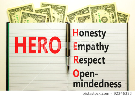 HERO honesty empathy respect open-mindedness symbol. Concept words HERO honesty empathy respect open-mindedness on white note, dollar background. HERO honesty empathy respect open-mindedness concept. 92246353