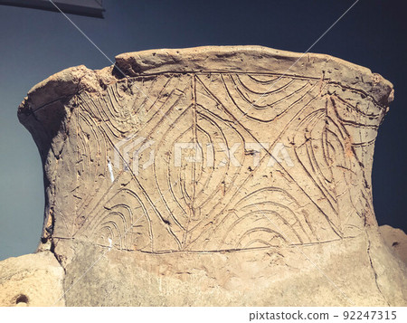 texture. ancient vase with damage. vase made of clay with a pattern, thin lines and ornaments. worn texture, background texture. ancient vase with damage. vase made of clay with a pattern, thin lines and ornaments. worn texture, background 92247315
