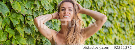 BANNER, LONG FORMAT Woman tourist walking in Montenegro. Panoramic summer landscape of the beautiful green Royal park Milocer on the shore of the the Adriatic Sea, Montenegro BANNER, LONG FORMAT Woman tourist walking in Montenegro. Panoramic summer landscape of the beautiful green Royal park Milocer on the shore of the the Adriatic Sea, Montenegro 92251375
