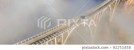 Montenegro. Dzhurdzhevich Bridge Over The River Tara foggy morning BANNER, LONG FORMAT 92251858