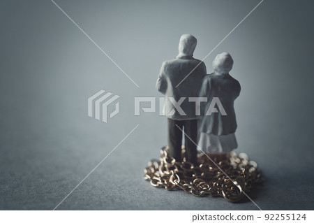 Back view of chain and senior couple Back view of chain and senior couple 92255124