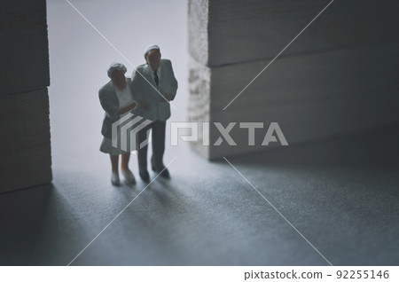 Door of light and senior couple 92255146