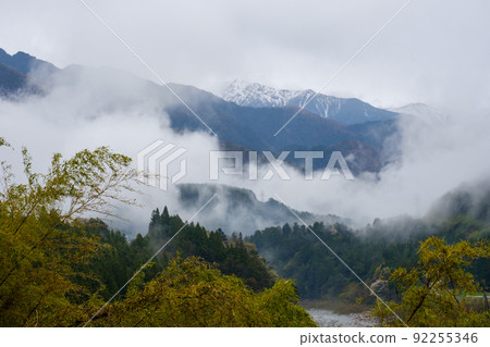 A mountain covered with deep fog and clouds, Mt. Kisokoma, Japanese Alps 92255346